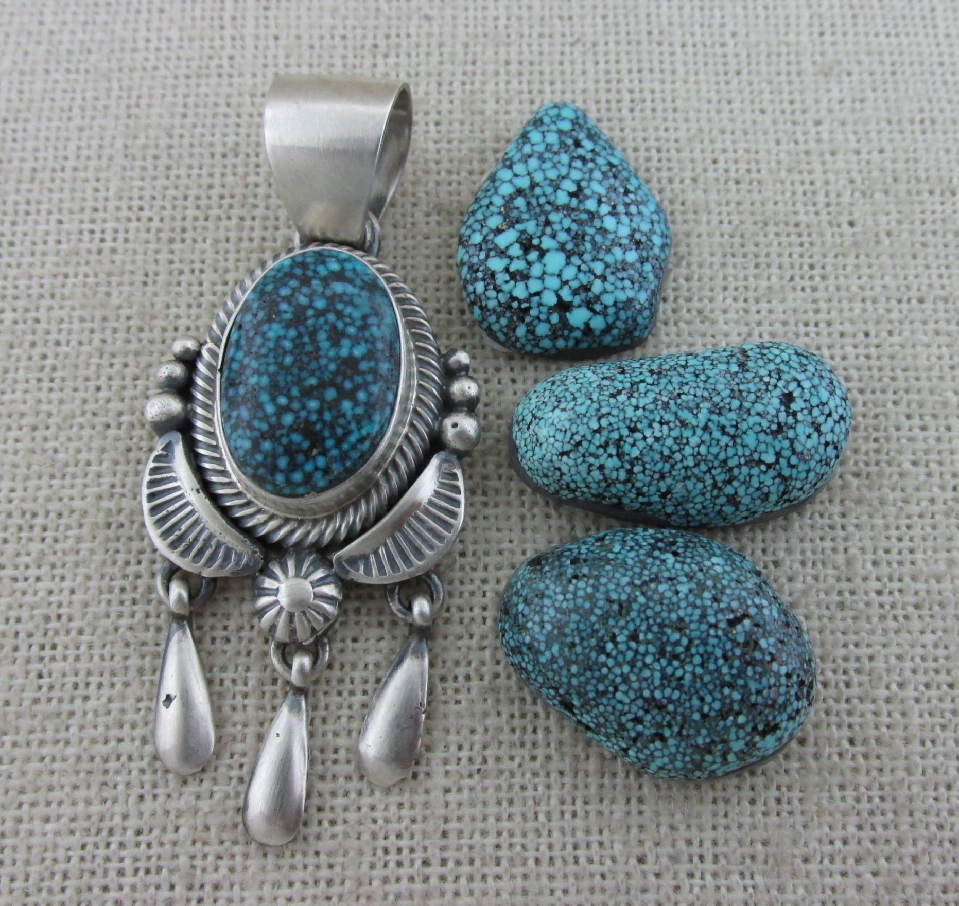 Kingman Spiderweb Turquoise Pendant and Cabochons